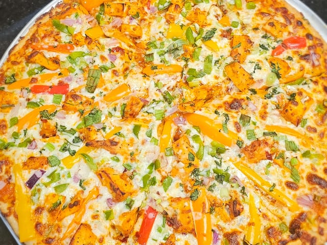 Schezwan Vegetable Pizza.